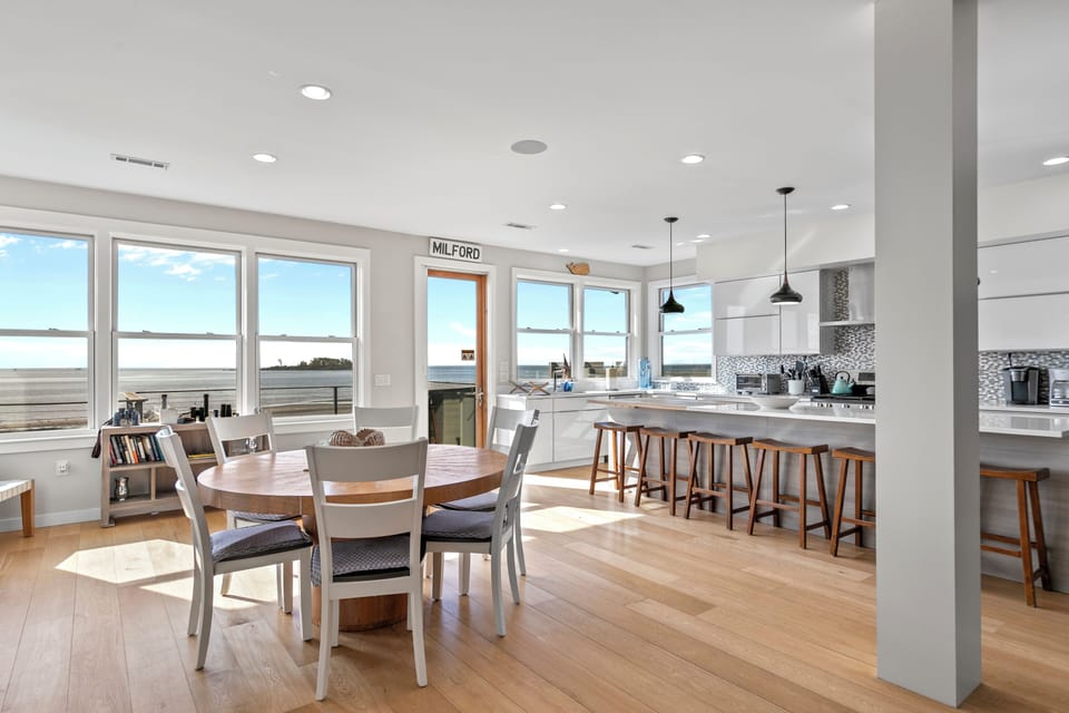 The great room with amazing views of the beach and Charles Island