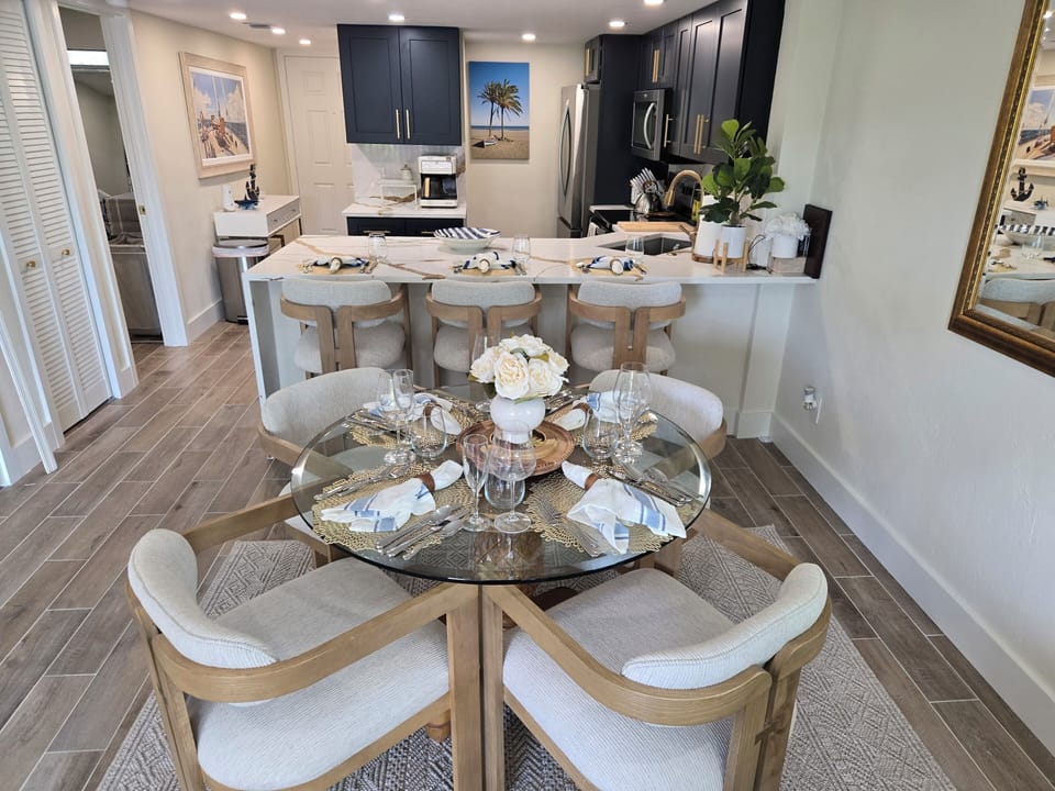 dining table for four also kitchen counter with an additional three seater