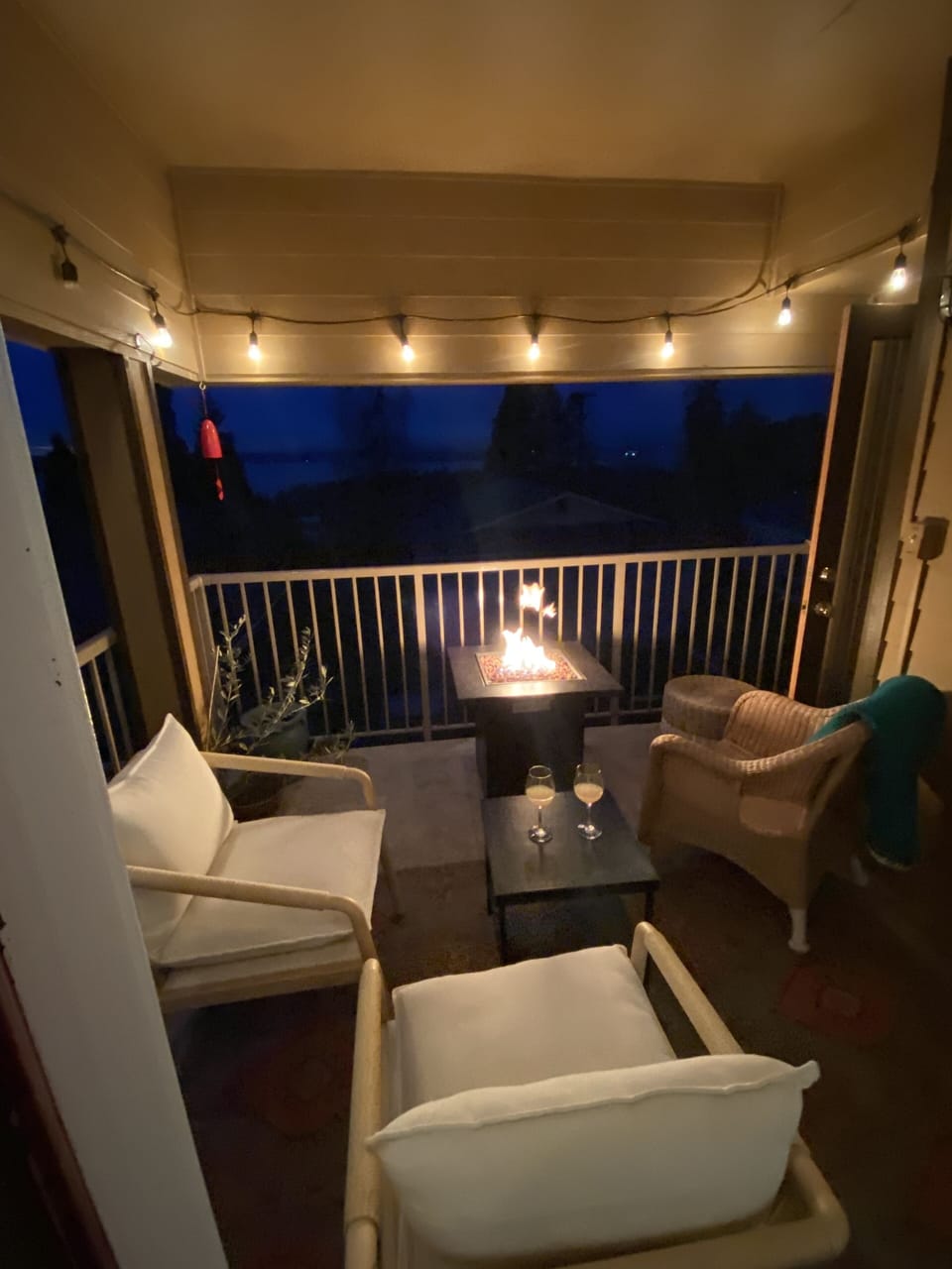 One of three view decks. This is located just off the dining area. Fire pit.