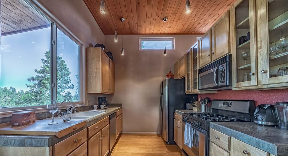 Modern, cozy kitchen with a "to die for" view of the mountains! (Main level)