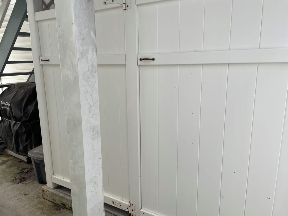 two outdoor showers