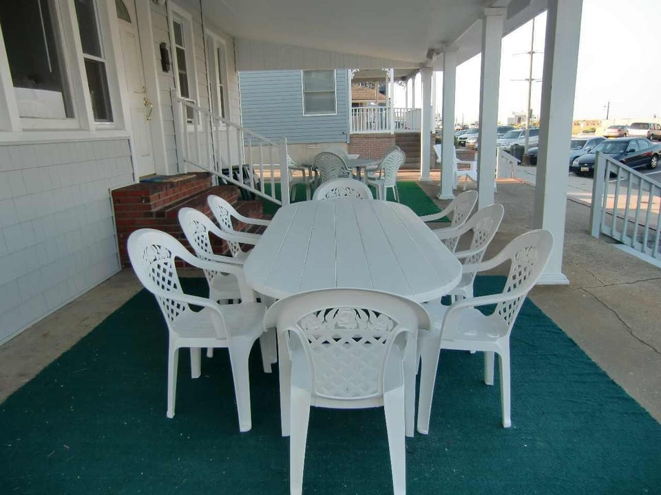 Outdoor dining  on oceanfront porch