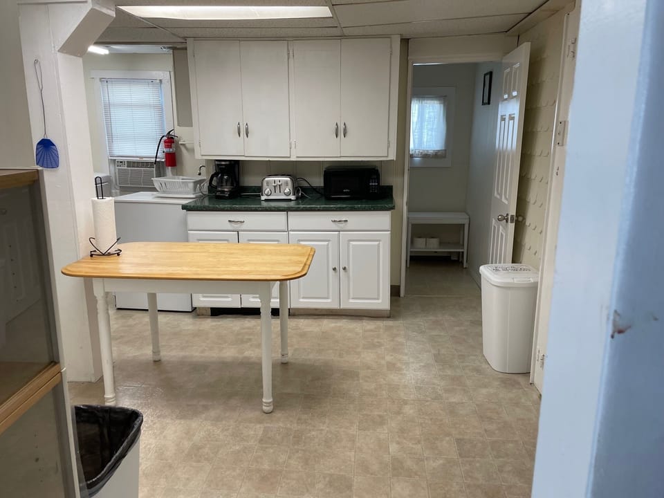 kitchen with view of downstairs half bath