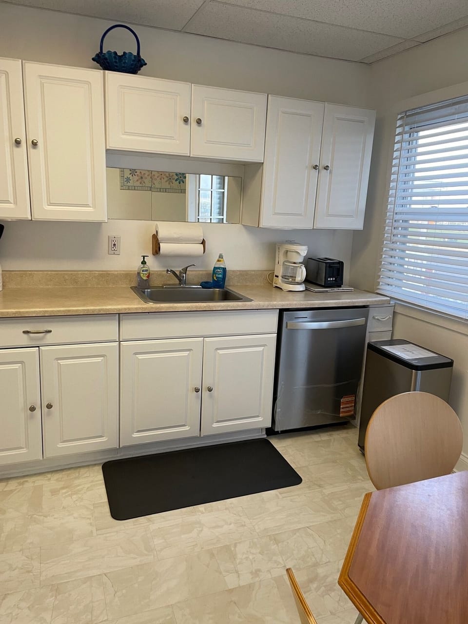 view from dining rom of kitchen and kitchen eating area 