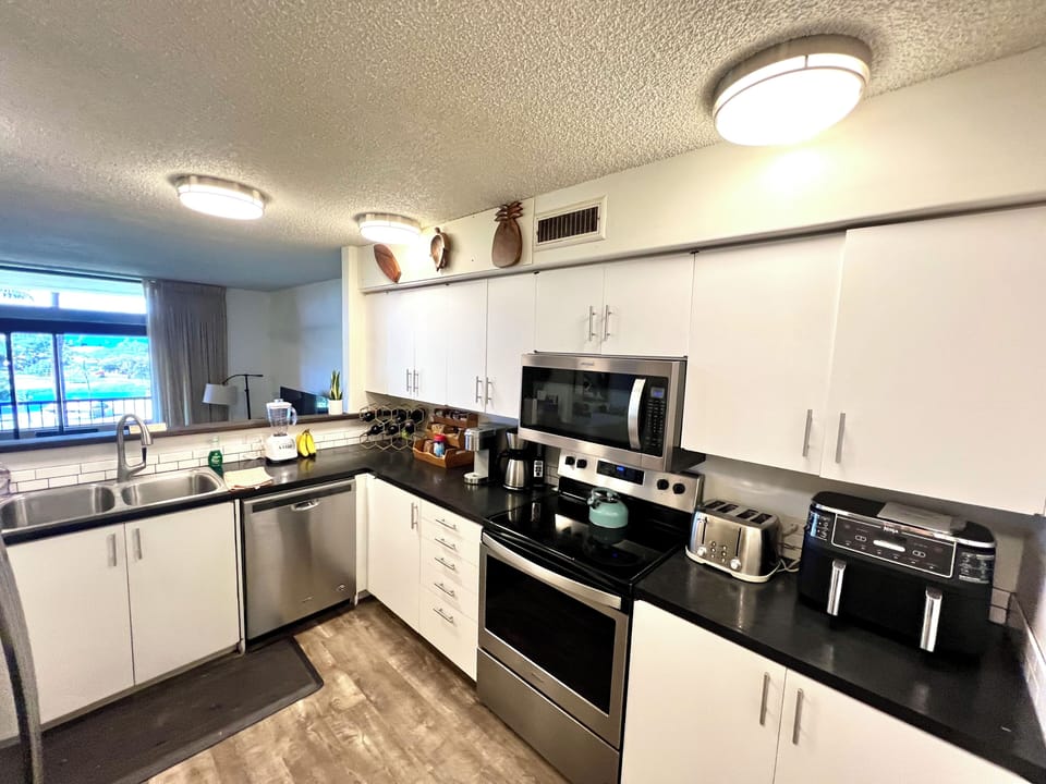 Photo taken on 11/26/24. Photo illustrating kitchen cabinet door repair