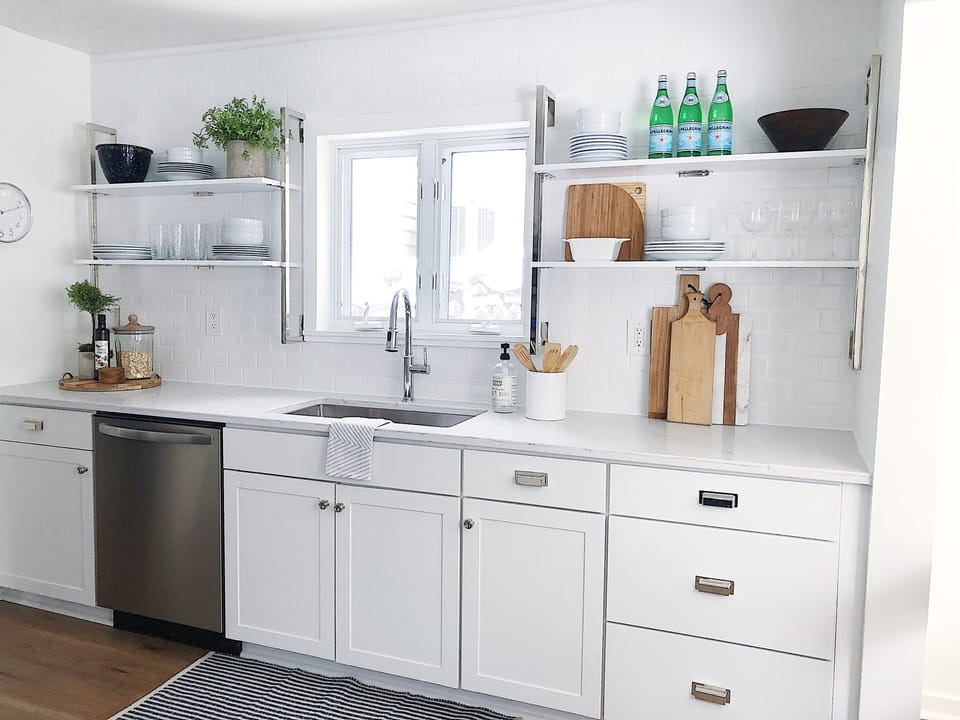 Full kitchen complete with stove, microwave, dishwasher and eat in dining nook. 