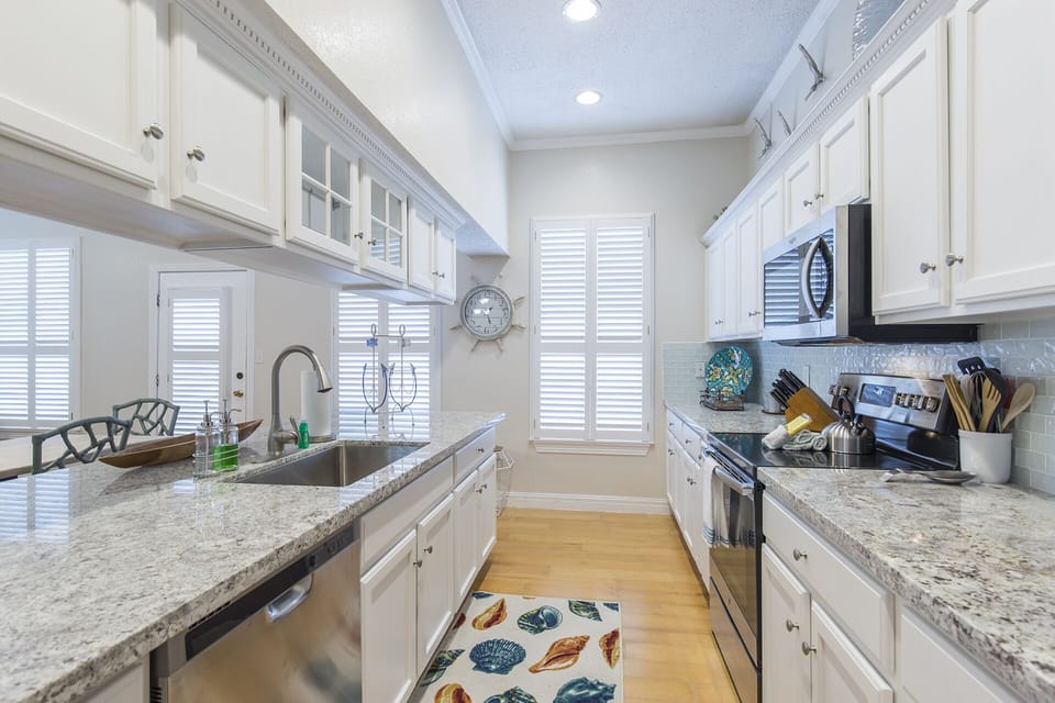 Generous counter space and modern appliances make cooking convenient during your stay.