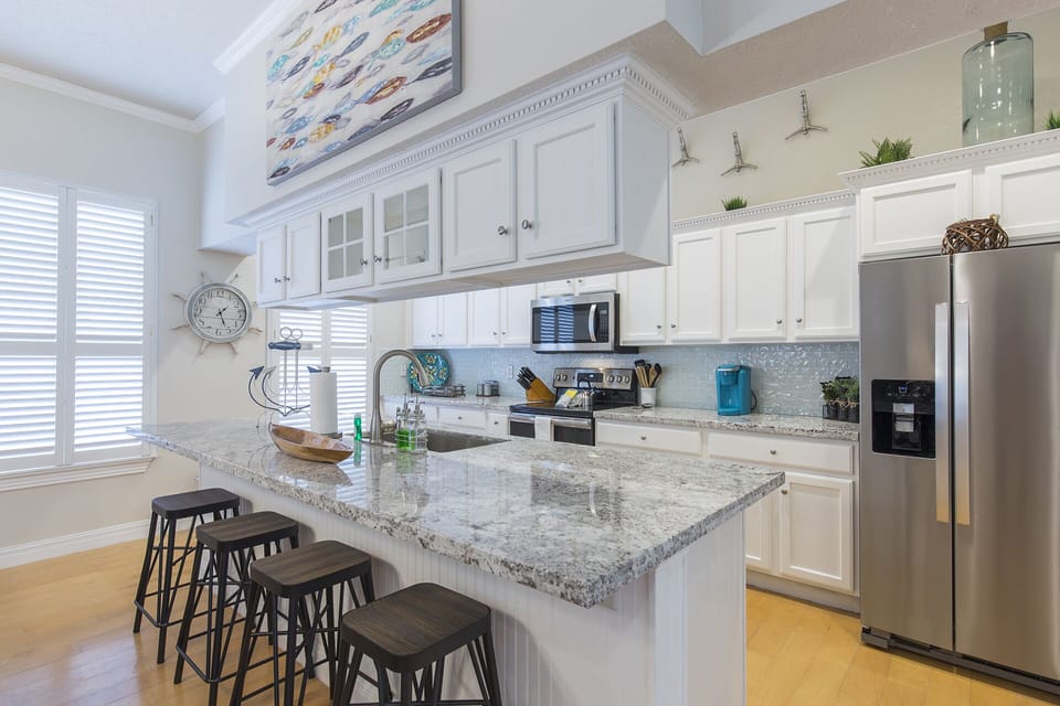 This gorgeous kitchen is fully stocked with all necessary cooking supplies!