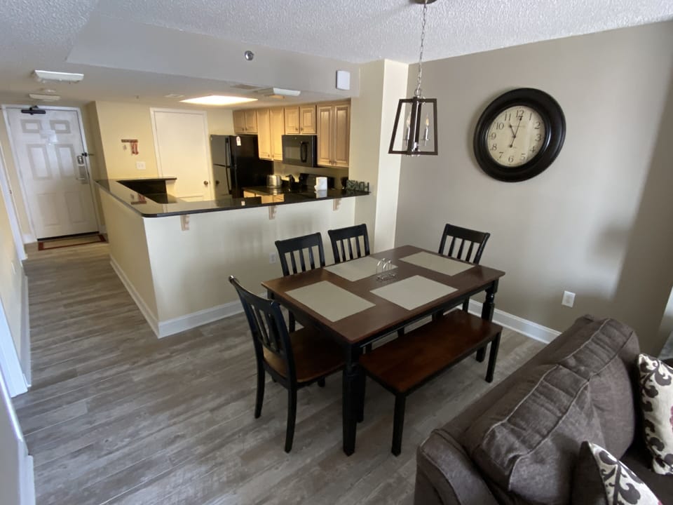 Dining area, and kitchen seating for 6 and kitchen area.