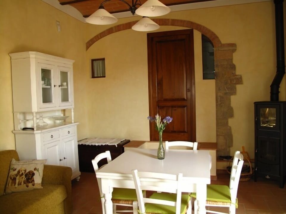 dinning area with wood-burning stove