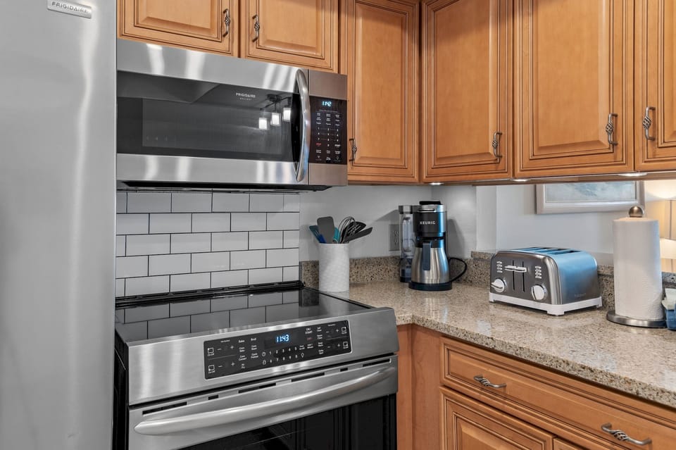 New stainless appliances including induction cooktop
