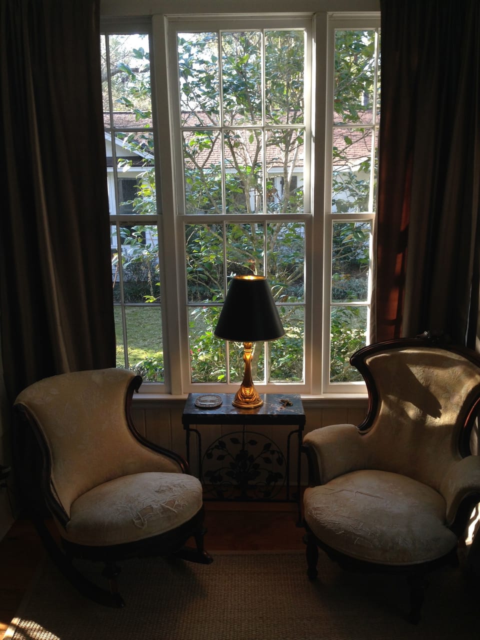 Sitting rm of master suite. It leads into master half bath.