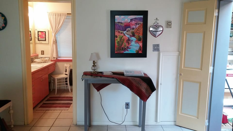 living room view into bathroom