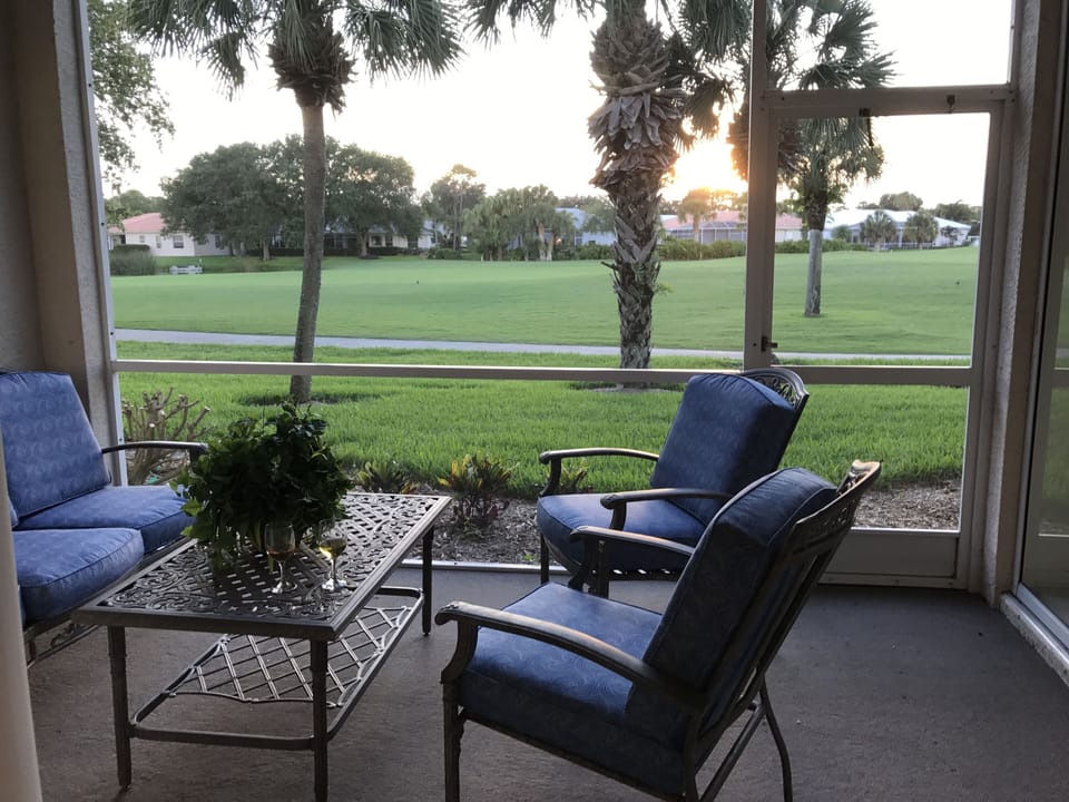 back lanai over looking 18th fairway at sunset