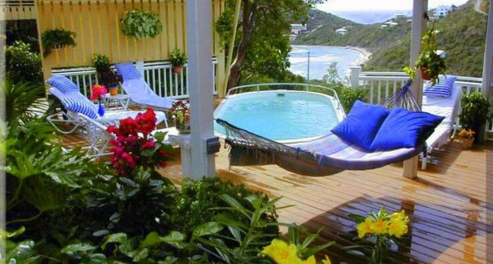 Relax in the hammock pool side.