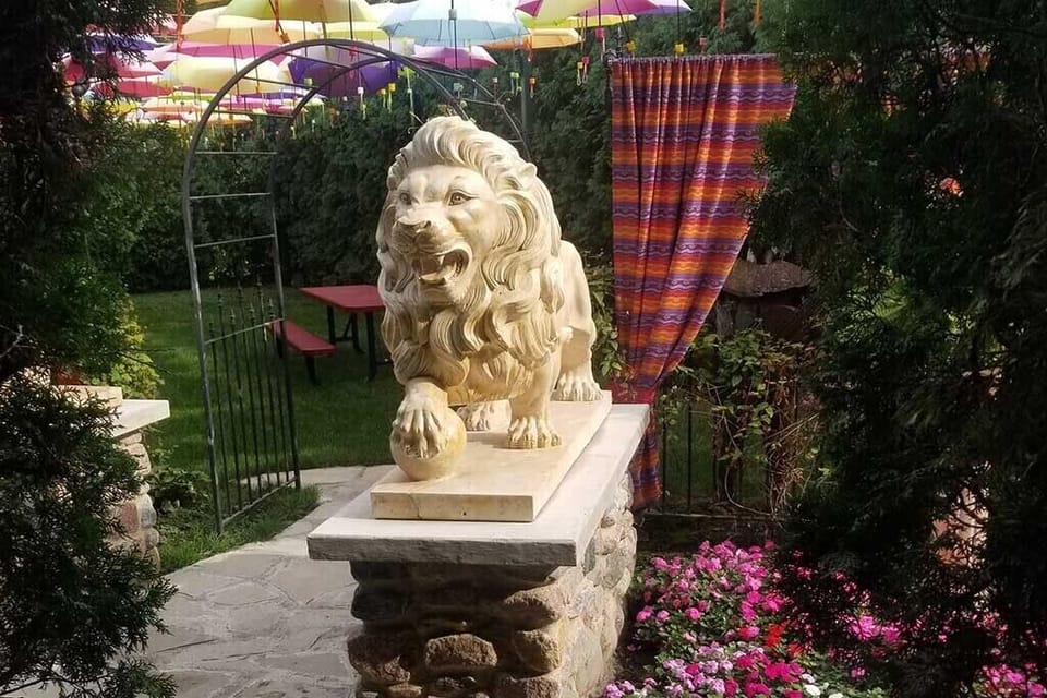 Lion Statues Seasonal Umbrella Garden Entrance