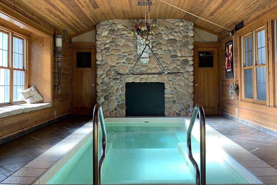 Attached Vaulted Ceiling Hot Tub room with 20-foot Hot Tub