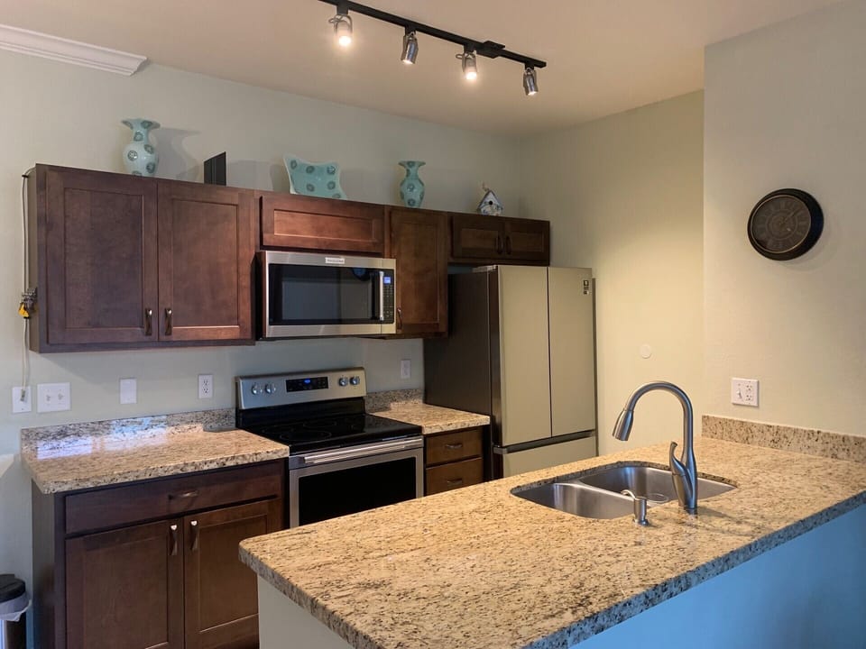 stainless steel appliances and Granite Countertops