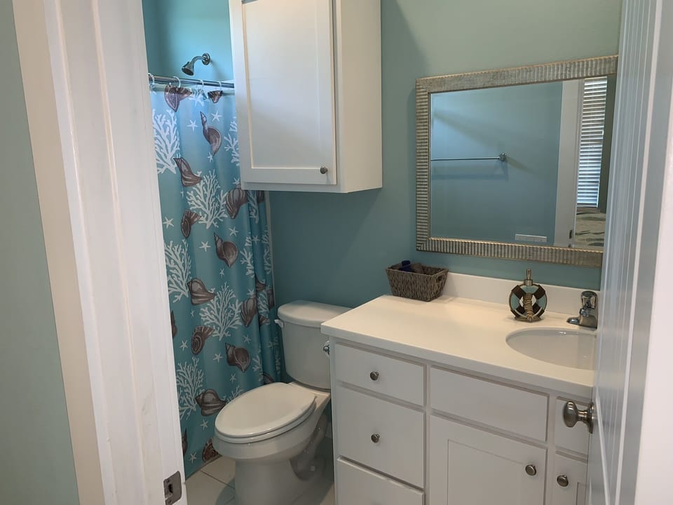 Full bath in left master suite