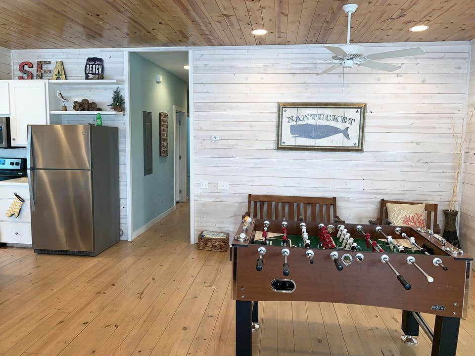 Foosball family area near open kitchen