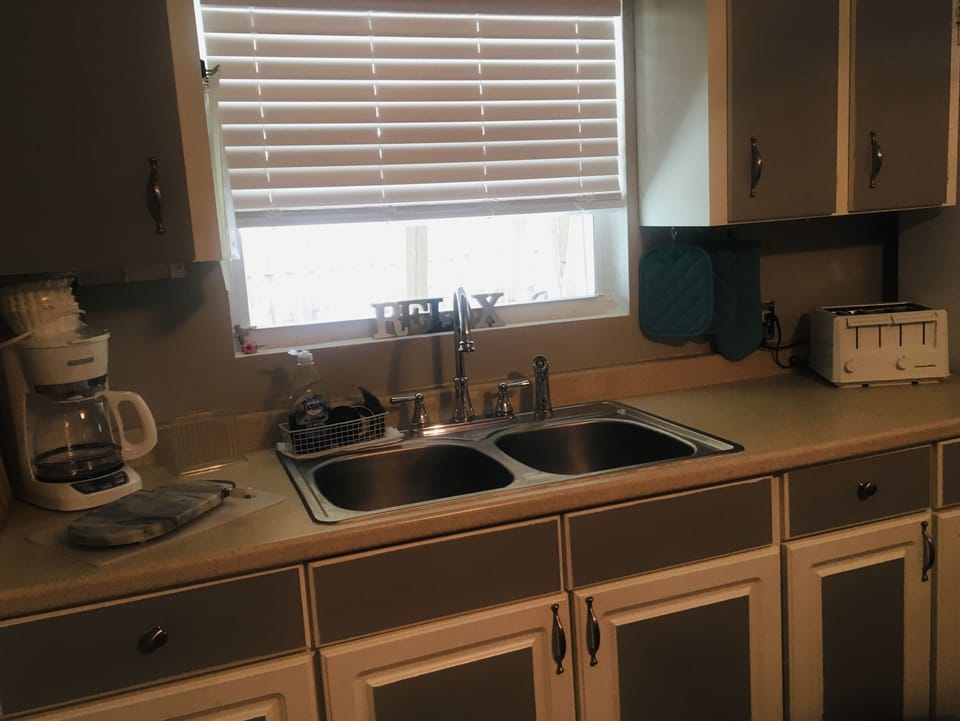 Kitchen: Toaster, coffee maker, sick