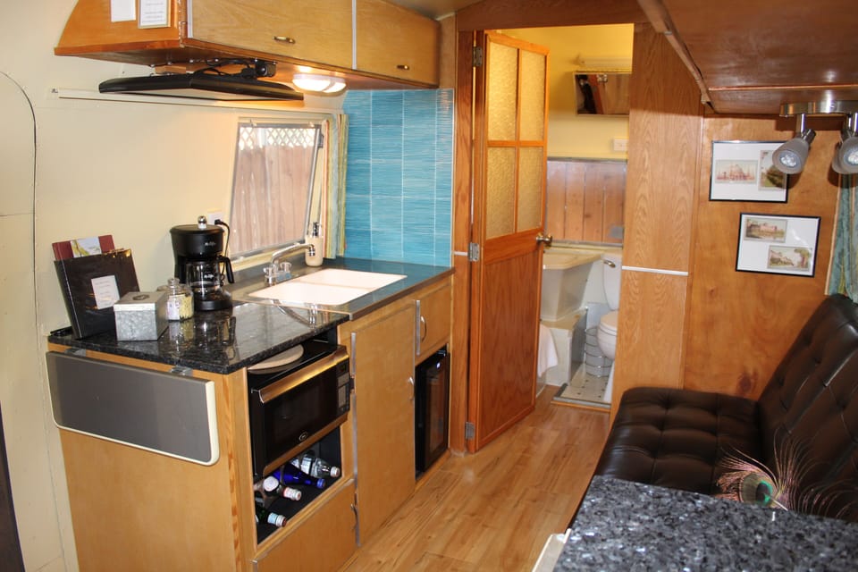 Microwave, wine cooler in kitchenette area