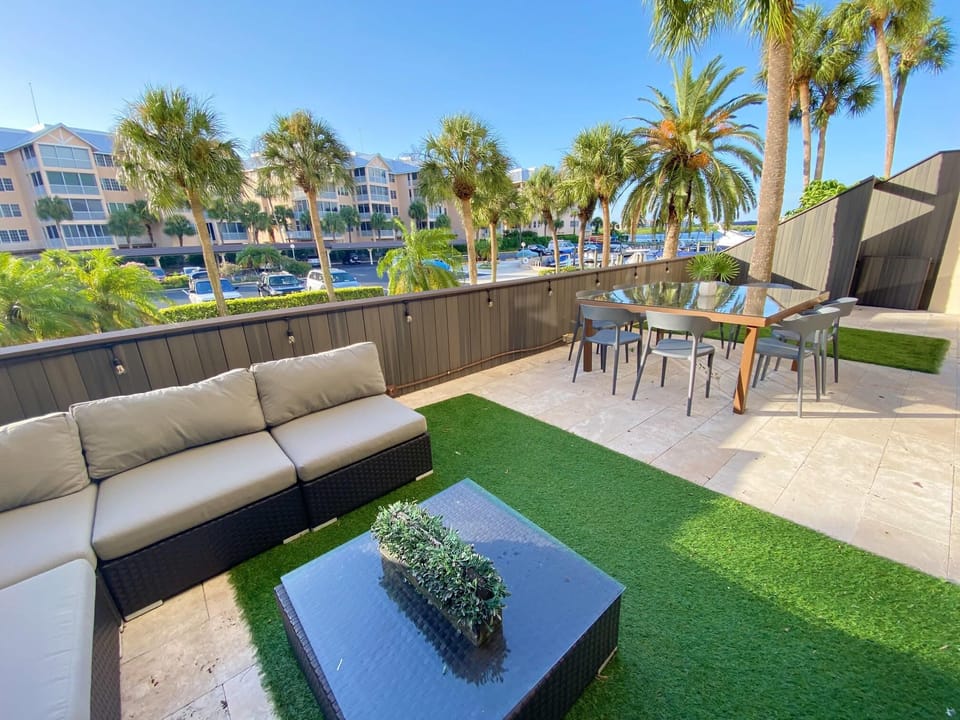 Large 550 sq ft Patio with Sectional and 8 person dining overlooking Marina