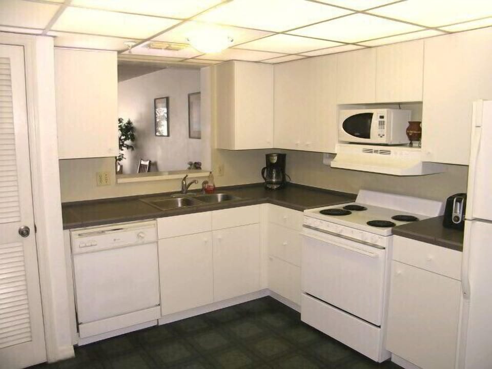 Newly renovated kitchen with porcelain countertop