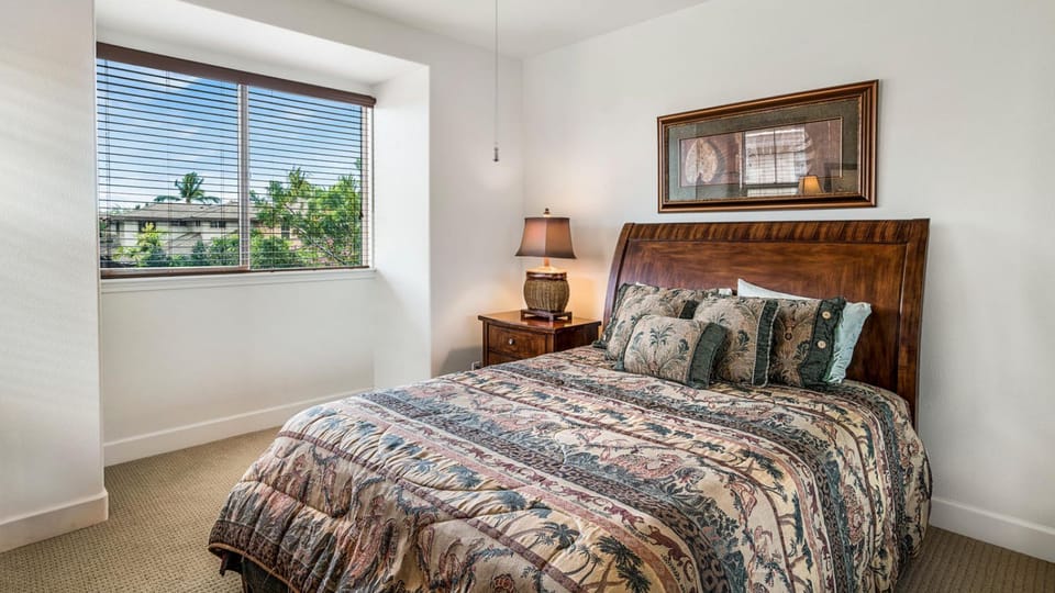 Bedroom with Large Bed and Ceiling Fan