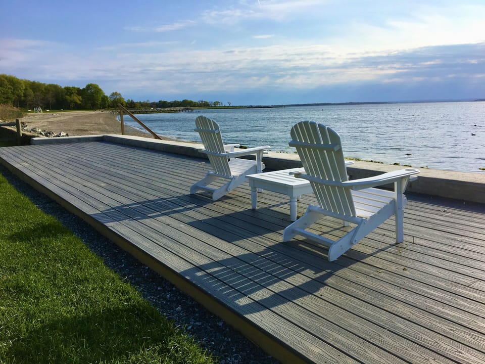 Waterfront deck with view of Bristol Town Beach & Colt State Park steps away.