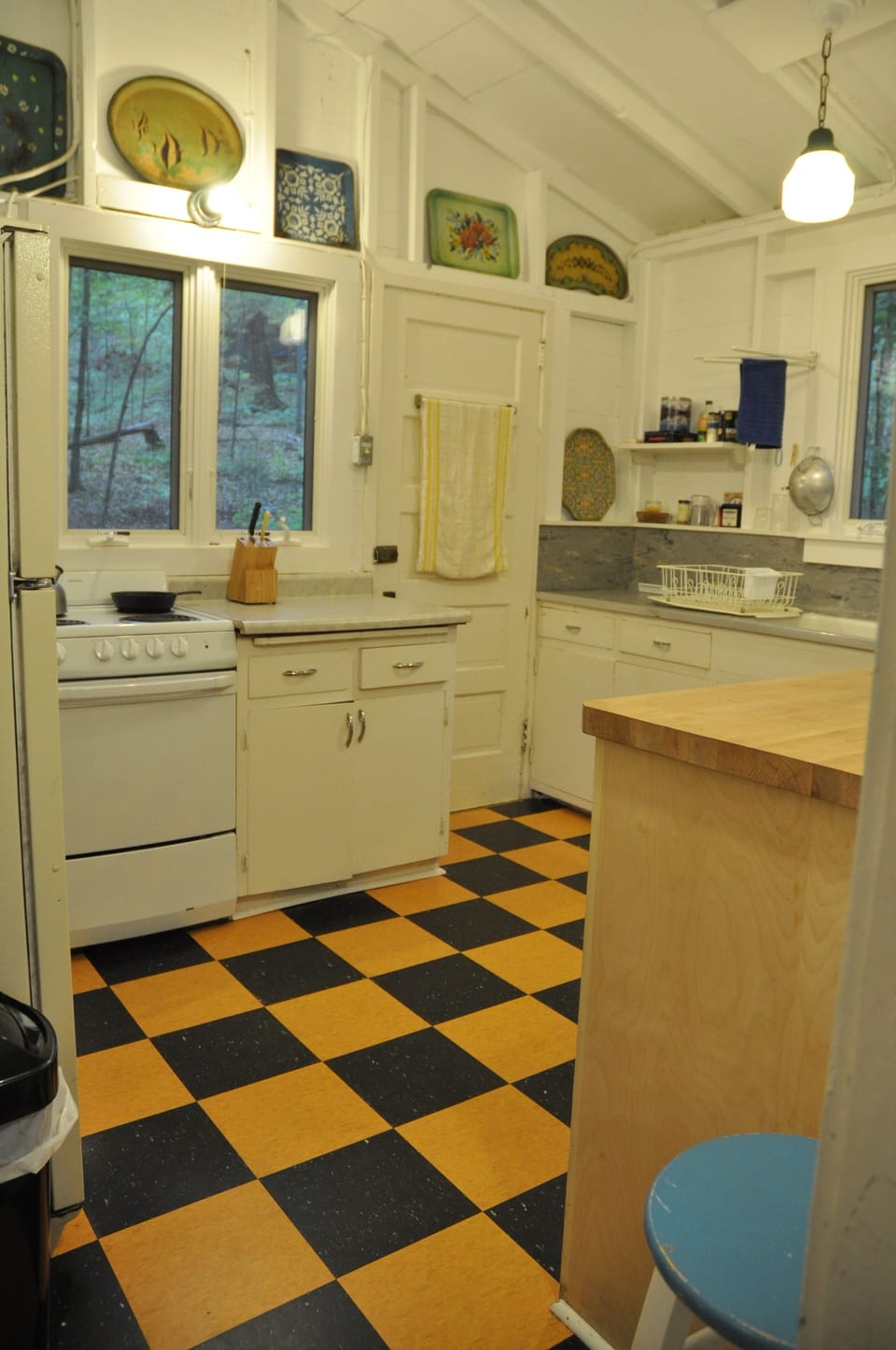 Looking into the kitchen from the dining area.