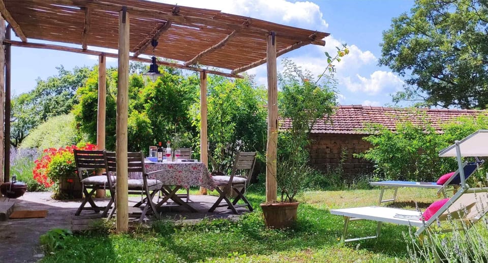 Zolferate, terrace with private garden full of aromatic mediterranean plants