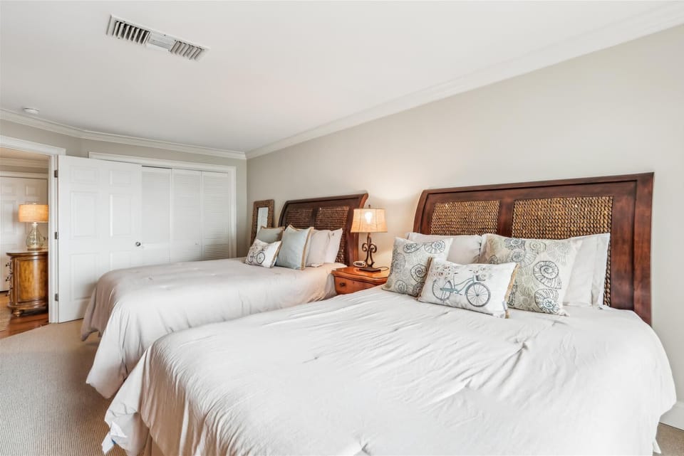 Guest Bedroom at 1882 Beachside Tennis