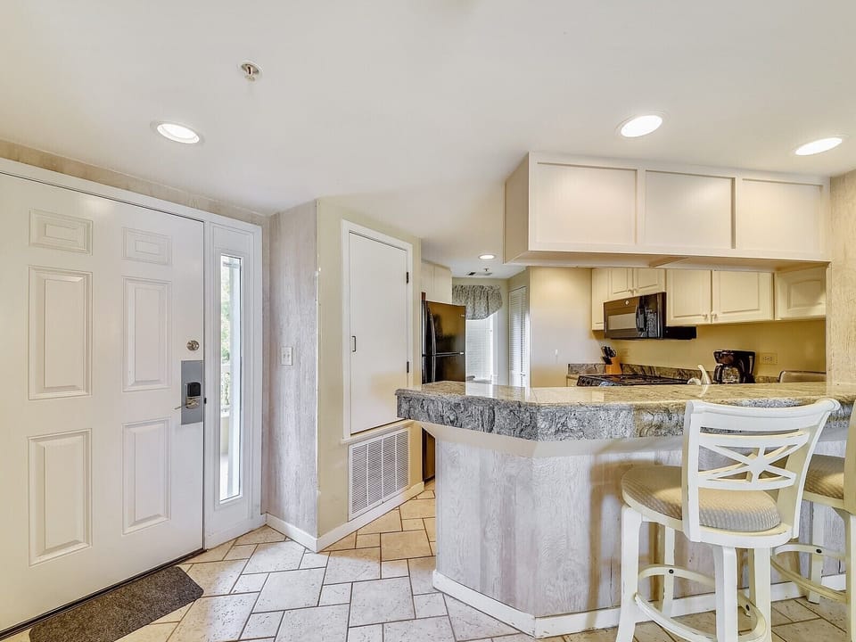 Kitchen with Breakfast Bar at 302 Barrington Arms