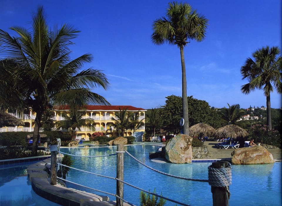 your room is just steps from the pool and the beach