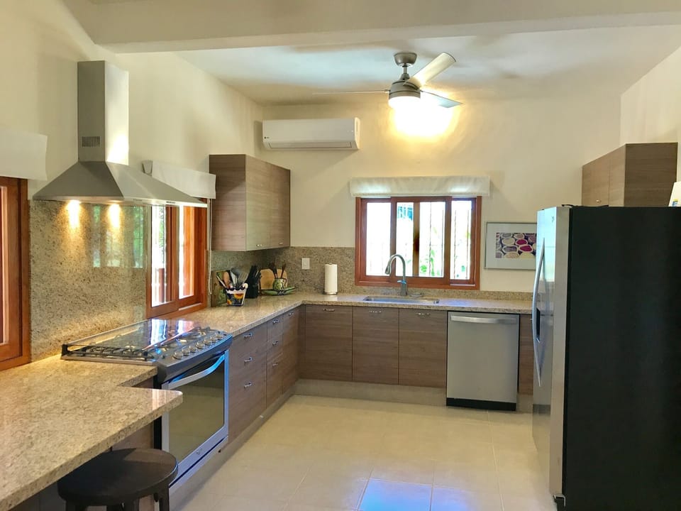 Kitchen with new range, dishwasher, microwave & refrigerator
