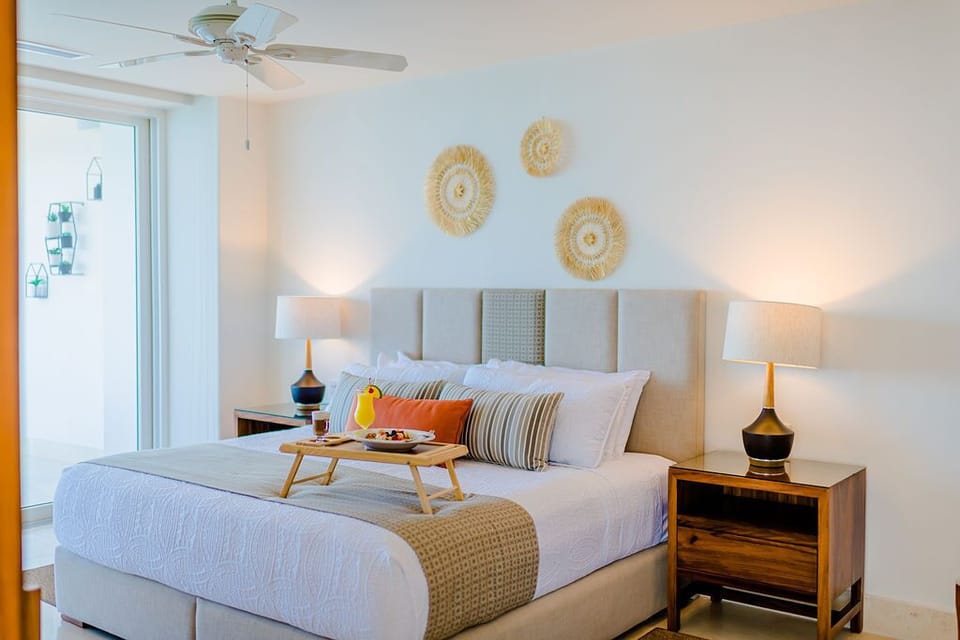 Master suite with a king size bed