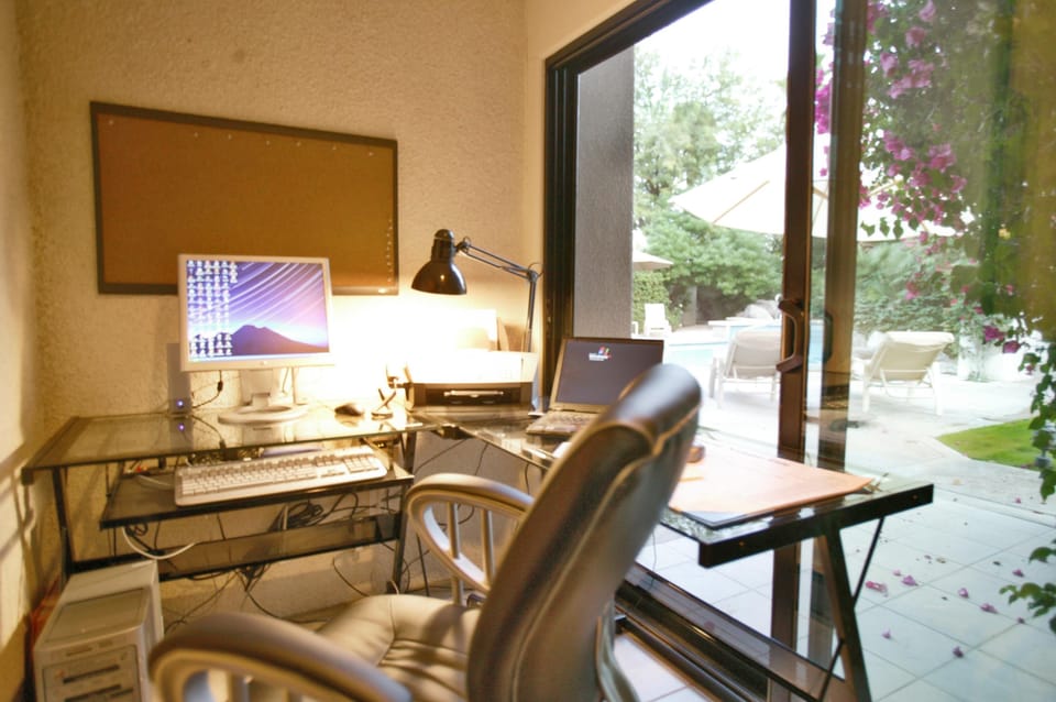 Private computer room with pool view