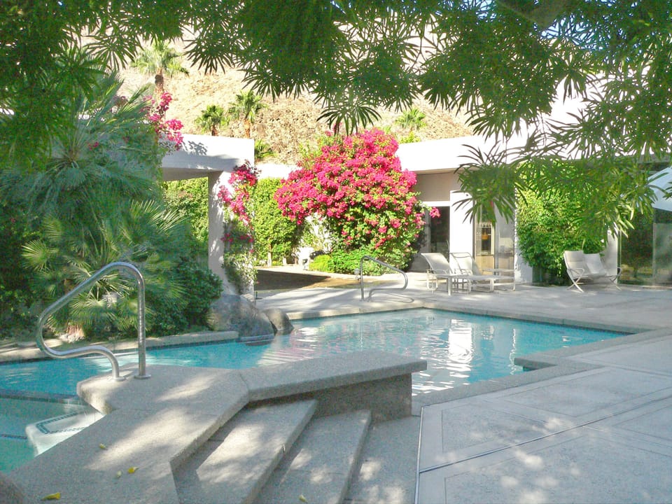 Relax poolside with cocktails and al fresco dining