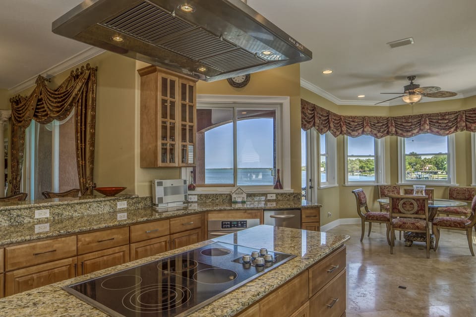 Kitchen and Eat-In Kitchen Area with Views and Door to 2nd Floor Veranda