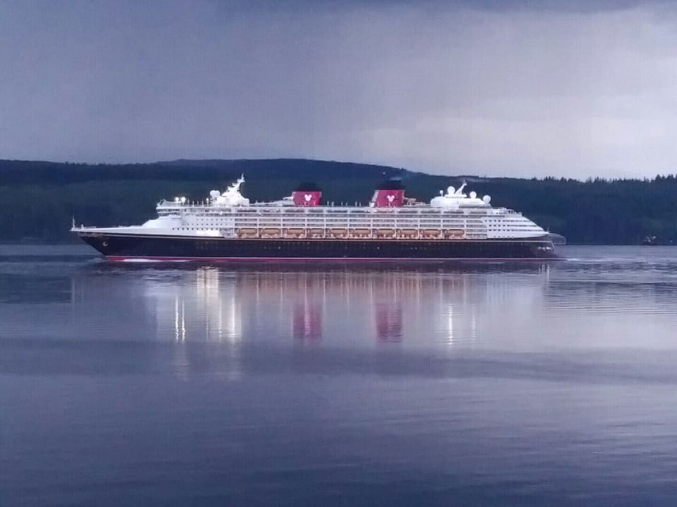 Disney cruise ship on a summer evening
