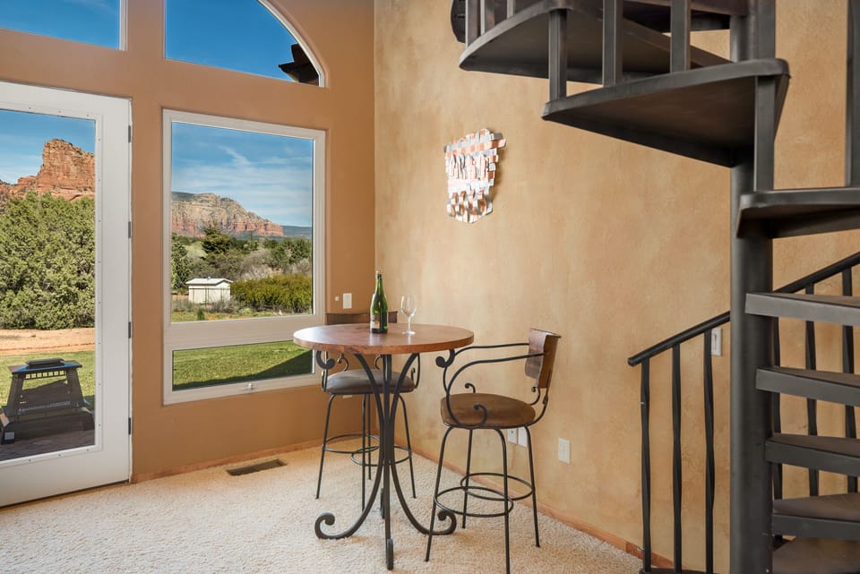 Living room with pounded copper table for dinning and watching the game