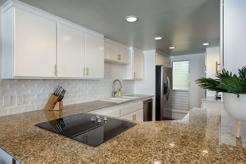 Cook with ease and joy! This fully-stocked kitchen is ready for you to prepare meals for the entire family.