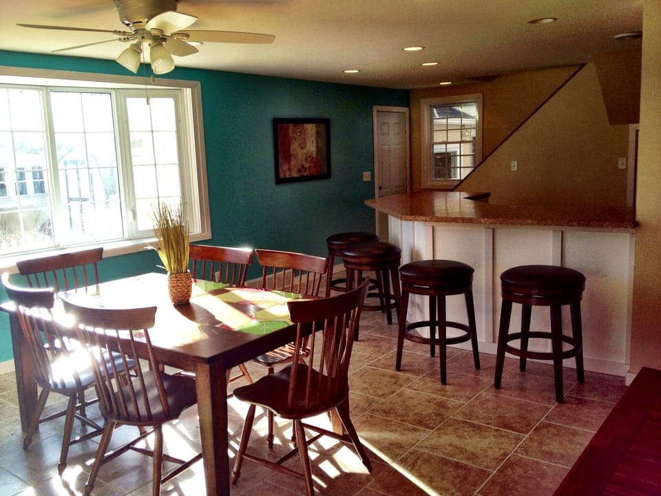 Sun drenched dining area, seats 10.