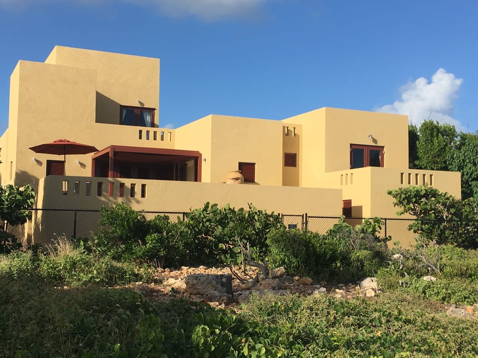 View of Pool Terrace, upper Master Bedroom/Balcony & Cabana/2nd Bedroom to right