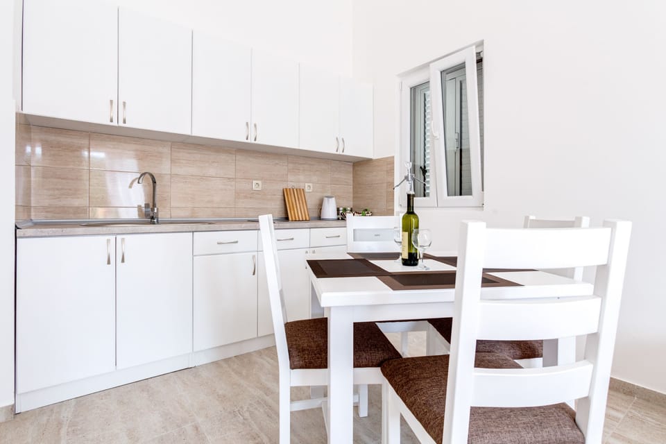 This is a seating or dining area, fully-equipped kitchen.