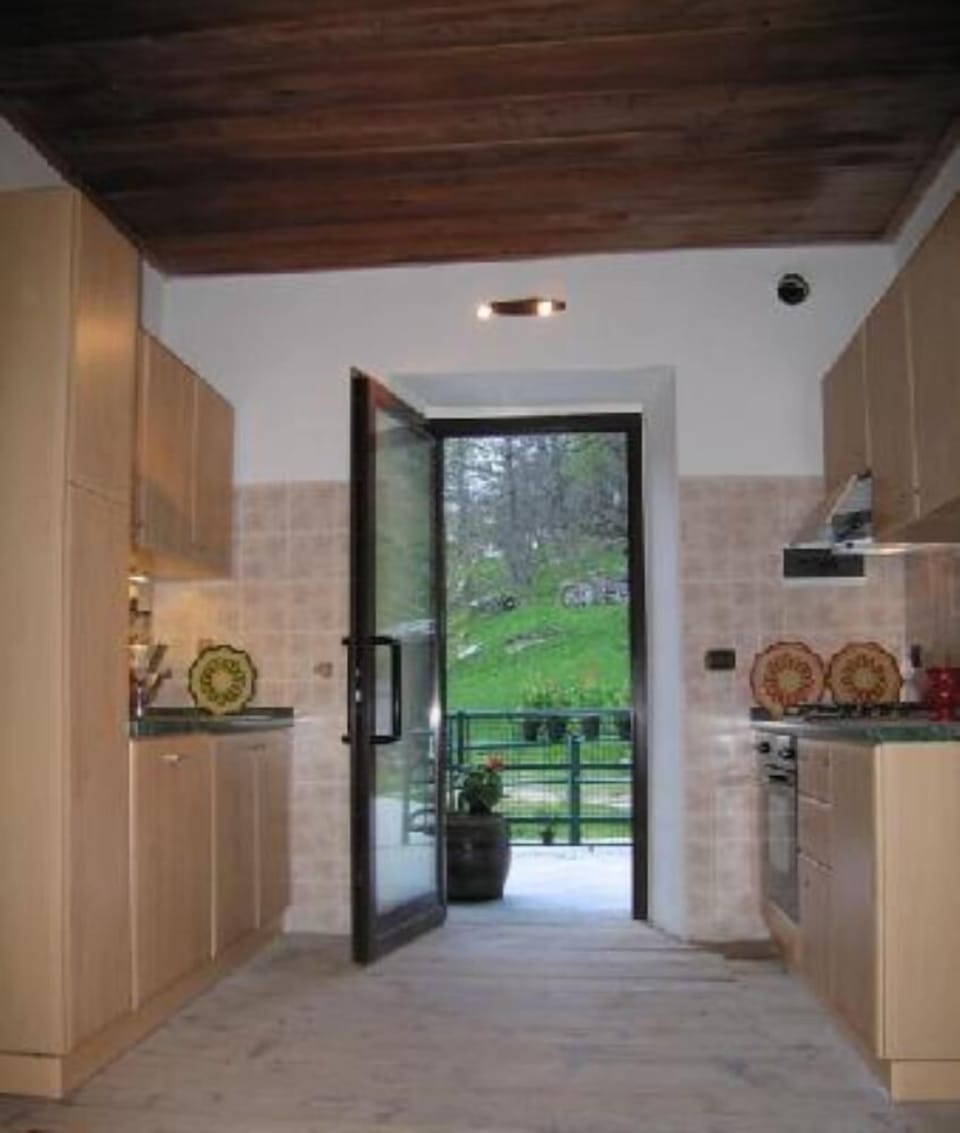 Kitchen with french door to the private garden