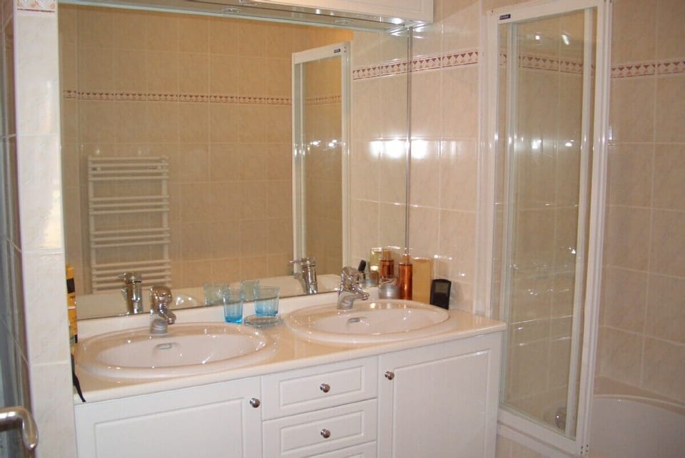 One of the 3 bathrooms in the apartment