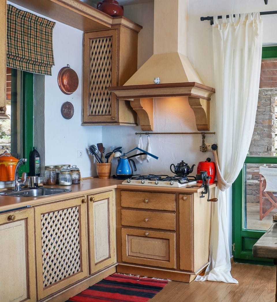 The kitchen with direct access to the outdoor dining area