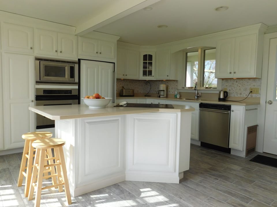 A modern kitchen with plenty of counter space.